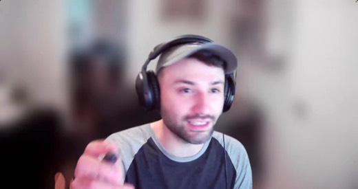 Sebastian Sagastume webcam, gesturing with pen while talking