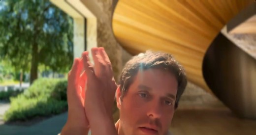 Tony Jones webcam, outdoors, clapping hands