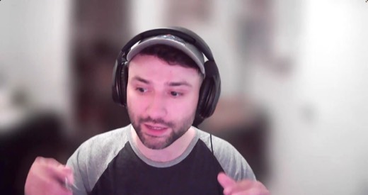 Sebastian Sagastume webcam, close-up, hands raised, talking