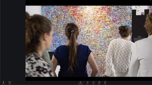 Near-duplicate of above (closer shot of visitors at the map wall).